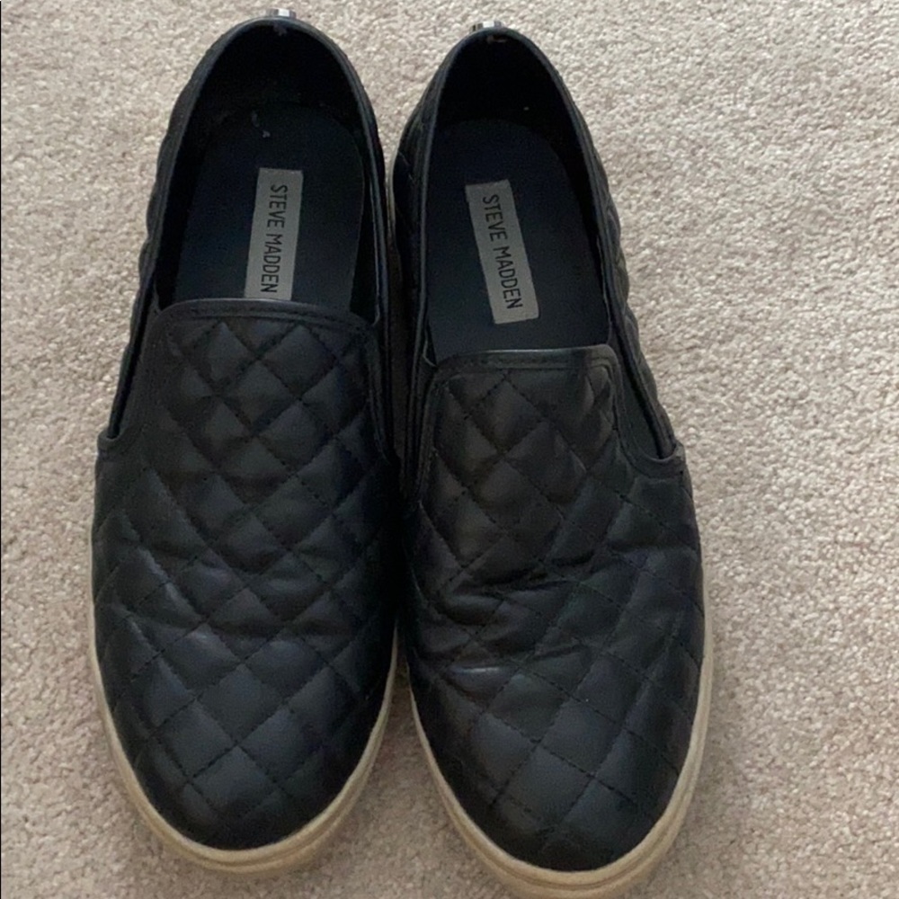 Black quilted slip-on sneakers